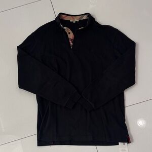 Burberry Black Long Sleeve Polo Shirt with the classic Burberry shirt.